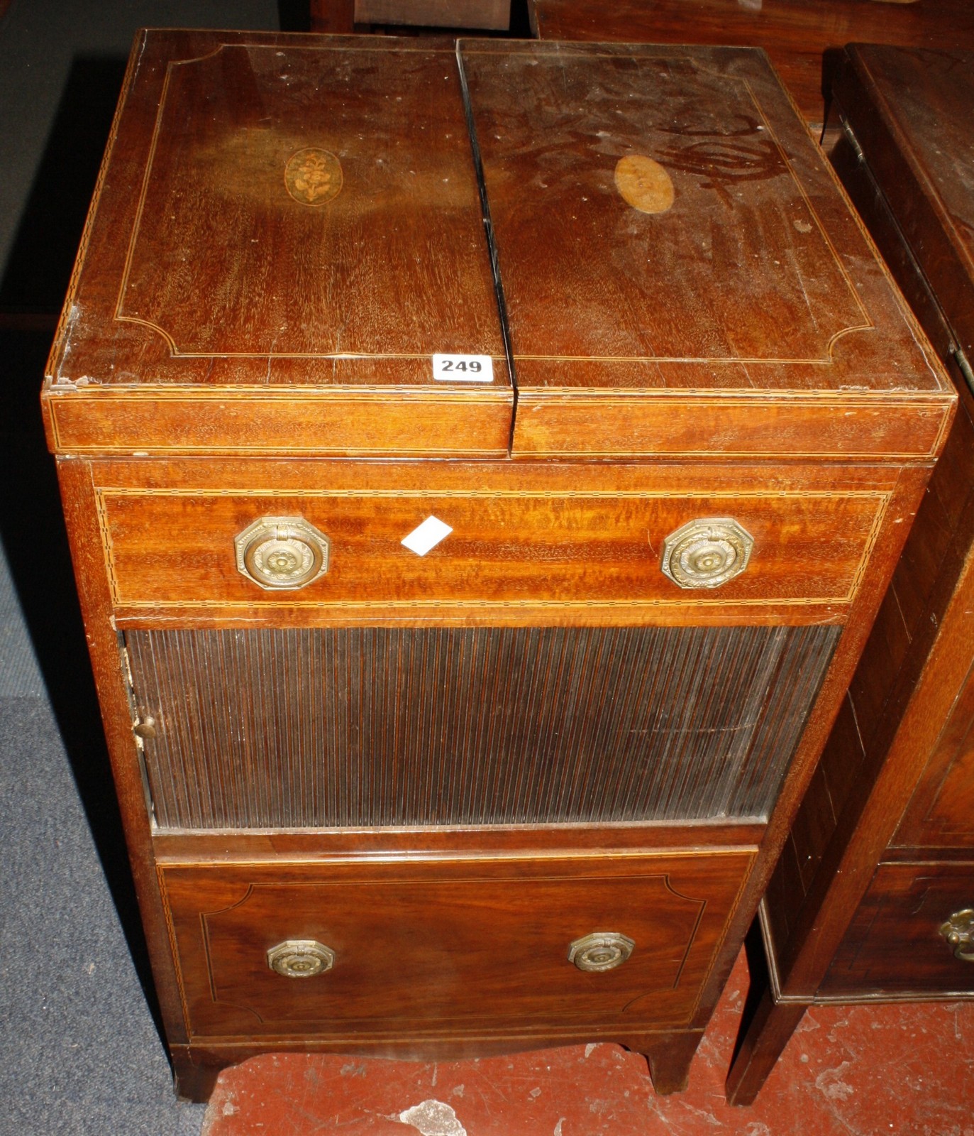 A Georgian mahogany inlaid washstand with tambour front opening 49cm wide