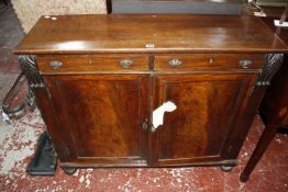 A George IV mahogany side cabinet (top adapted) 111cm wide