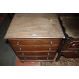 A Gillows style mahogany commode cabinet with two FALSE drawers to the hinged top 64cm wide