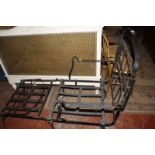 A 19th century strap metal work campaign bed and Worcester ware kitchen cupboards