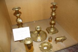 A pair of brass candlesticks, an ashtray, model pig and other items Best Bid