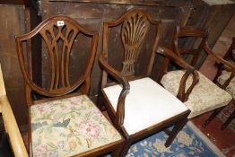 A matched pair of early 19th Century dining chairs, together with two shield back dining chairs