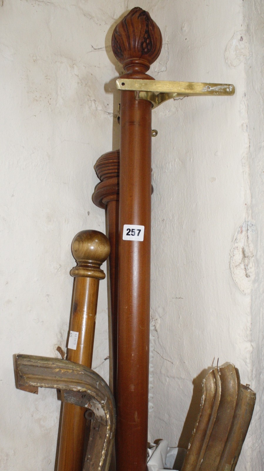 Two giltwood pelmets and three curtain poles Best Bid