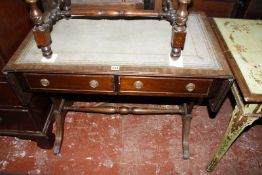 A 19th century mahogany side table on twisted supports and a Regency style mahogany sofa table.