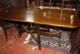 A 20th Century oak gateleg table 154cm wide
