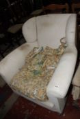 An early 20th century armchair in calico. Best Bid