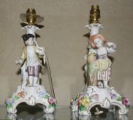 A pair of Dresden table lamps, flower and fruit seller, 24cm high approx.