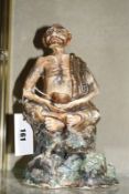 A Satsuma decorated figure of a beggar. 27cm high.