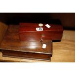 Two billiard balls in a mahogany fitted case by Burroughs & Watts Ltd, Soho Square, London (one