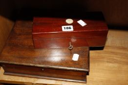 Two billiard balls in a mahogany fitted case by Burroughs & Watts Ltd, Soho Square, London (one