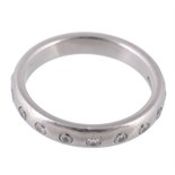 A diamond eternity ring, the band set with brilliant cut diamonds in rubover...  A diamond