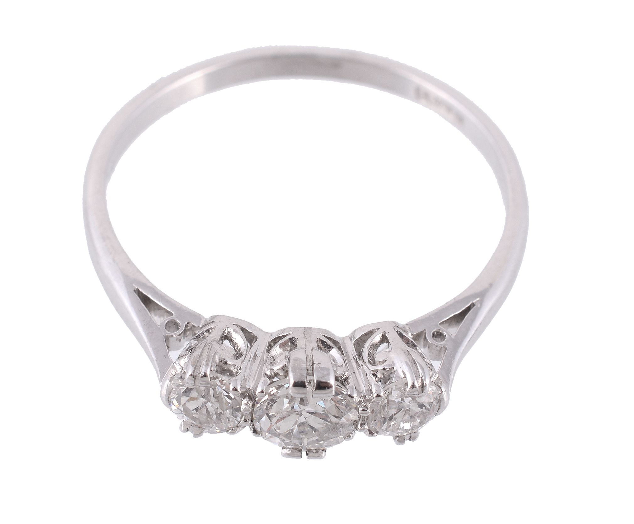 A three stone diamond ring, set with three brilliant cut diamonds in claw...  A three stone