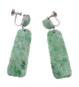 A pair of jadeite ear pendents, the carved panels with a circular shaped...  A pair of jadeite ear