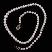 A cultured pearl necklace, the single strand of graduated cultured pearls on...  A cultured pearl