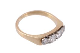 An 18 carat gold diamond ring, set with four brilliant cut diamonds  An 18 carat gold diamond ring,
