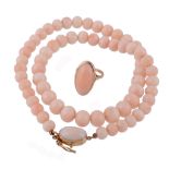 A coral bead necklace, composed of graduated polished coral beads  A coral bead necklace,   composed