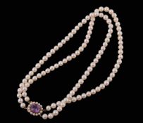 A two row cultured pearl necklace, composed of uniform 6mm cultured pearls  A two row cultured pearl