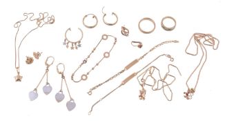 A collection of gold coloured jewellery, to include; an 18 carat gold band...  A collection of