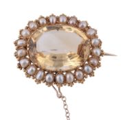 An early Victorian citrine and pearl brooch, circa 1850  An early Victorian citrine and pearl