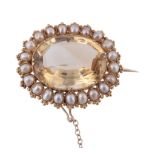 An early Victorian citrine and pearl brooch, circa 1850  An early Victorian citrine and pearl