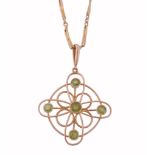 A peridot set pendant on chain, the pierced quatrefoil pendant set with five...  A peridot set