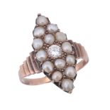 A half pearl and diamond ring, the marquise shaped panel set with a central...  A half pearl and