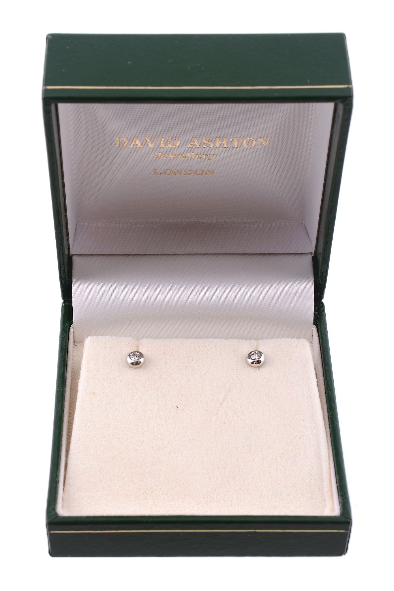 A pair of diamond earstuds, the brilliant cut diamonds in polished platinum...  A pair of diamond