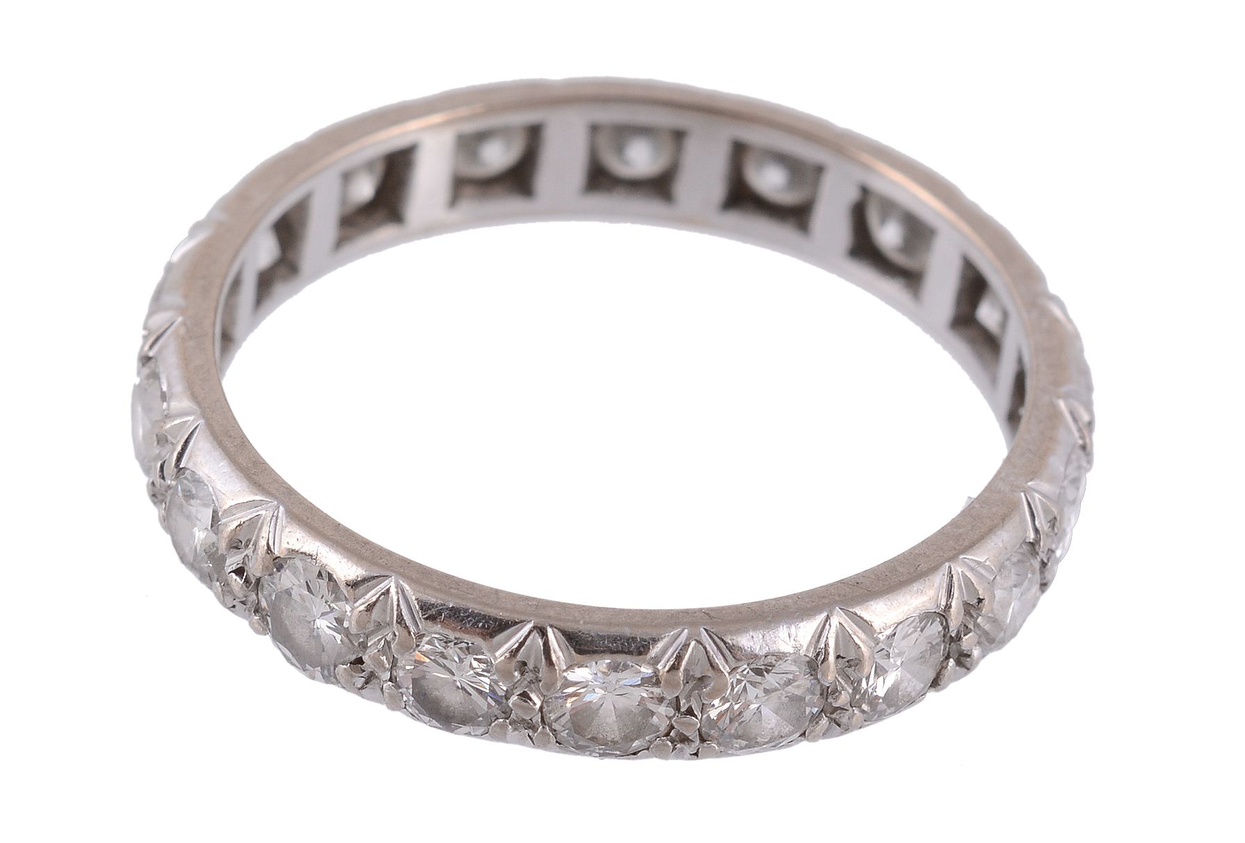 A diamond eternity ring, set throughout with brilliant cut diamonds  A diamond eternity ring,