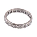 A diamond eternity ring, set throughout with brilliant cut diamonds  A diamond eternity ring,