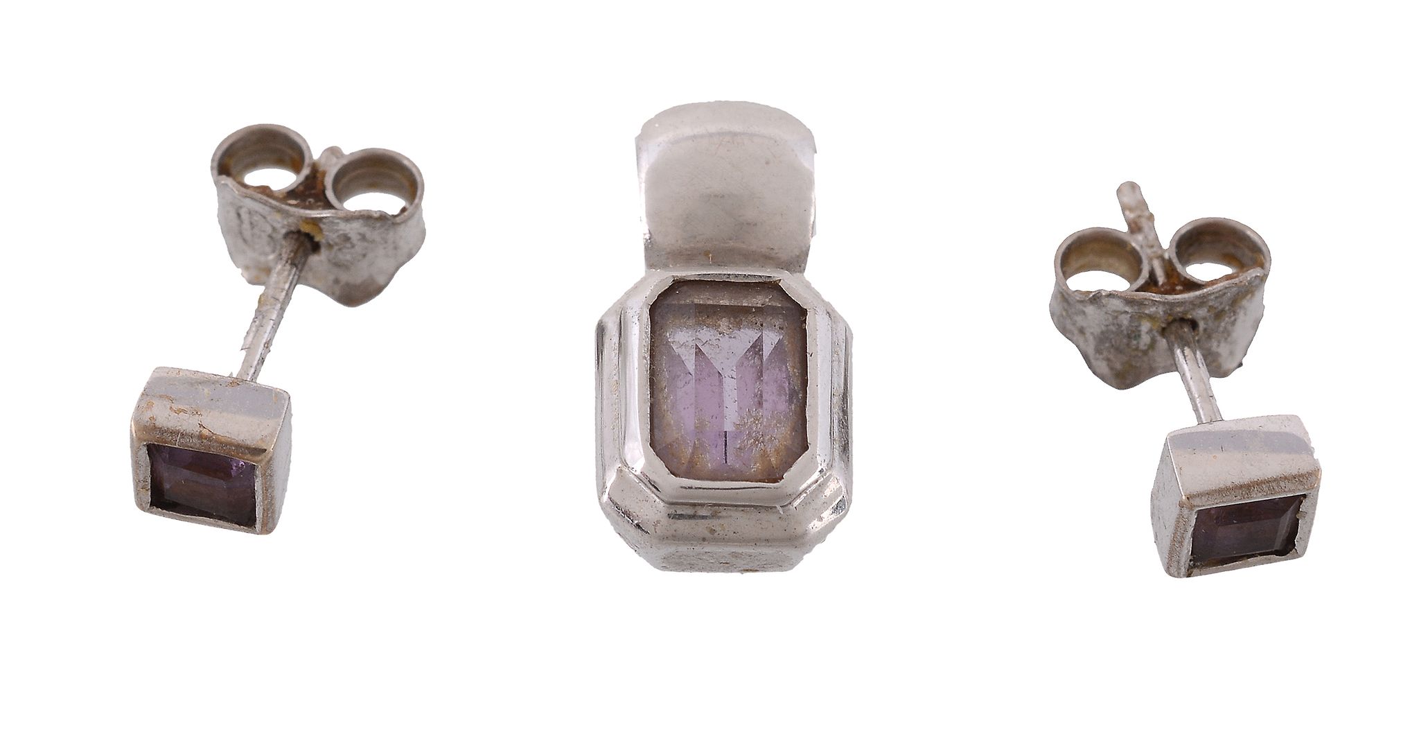 A pair of amethyst ear studs, set with a square shaped amethyst in a collet...  A pair of amethyst