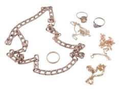 A fancy link chain, stamped 375; two further necklaces stamped 375; a bracelet  A fancy link chain,