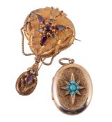 A Victorian turquoise locket, the oval shaped locket with a central star...  A Victorian turquoise