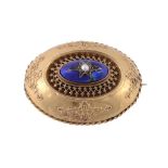 A Victorian gold brooch , the oval brooch with applied ropetwist decoration  A Victorian gold brooch