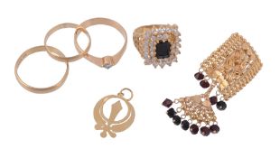 A collection of gold coloured jewellery , to include two 22 carat gold band...  A collection of gold