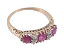 A ruby and diamond ring, the three oval shaped rubies claw set with old cut...  A ruby and diamond