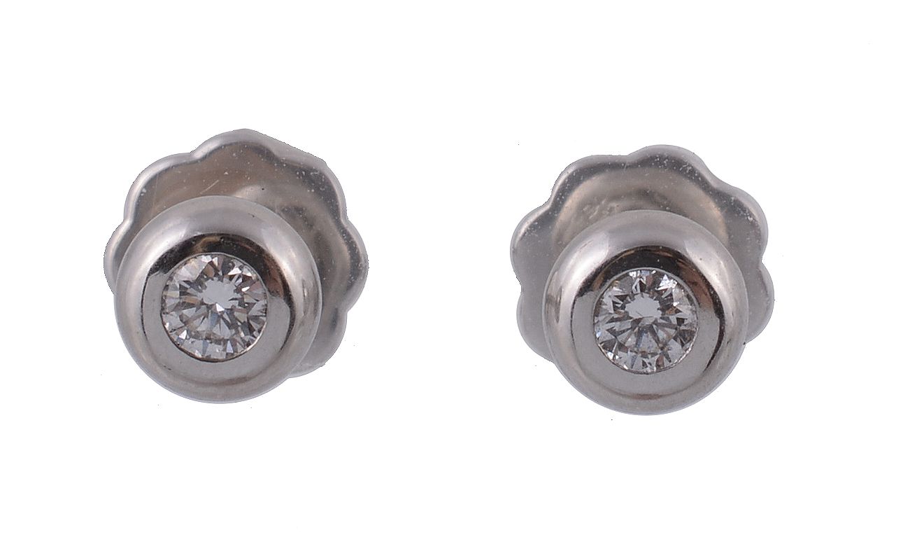 A pair of diamond earstuds, the brilliant cut diamonds in polished platinum...  A pair of diamond - Image 2 of 2