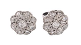 A pair of diamond cluster ear studs , the central brilliant cut diamonds...  A pair of diamond