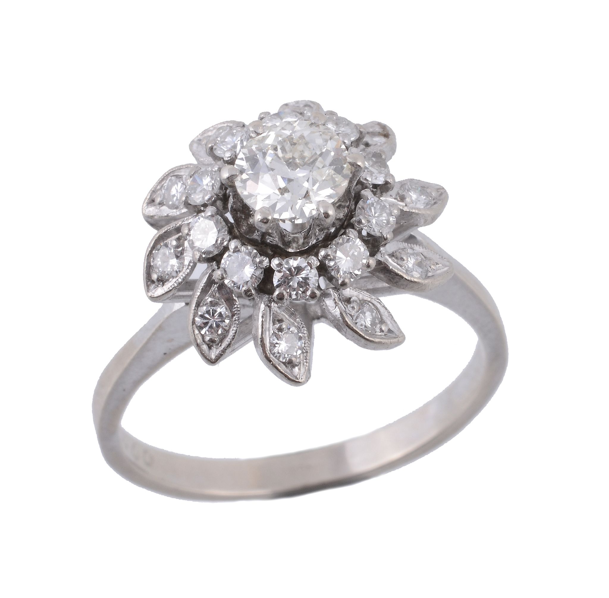 A diamond cluster ring, the central brilliant cut diamond in a raised claw...  A diamond cluster