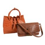 Delvaux, a brown ostrich leather clutch style handbag  Delvaux, a brown ostrich leather clutch style