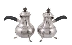 A pair of late Victorian silver cafe au lait pots by Holland  A pair of late Victorian silver cafe