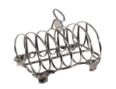 A William IV silver six division toast rack, London 1833  A William IV silver six division toast
