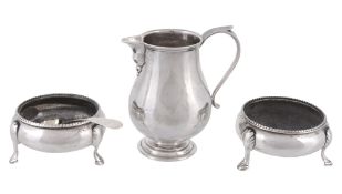 A pair of Victorian silver compressed circular salts by Robert Harper  A pair of Victorian silver