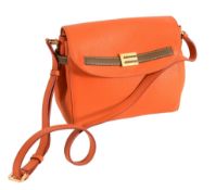Etro, an orange leather handbag, with fold over clasp and shoulder strap  Etro, an orange leather
