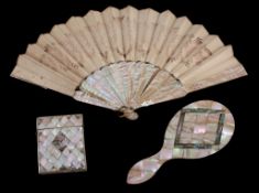 A Victorian mother of pearl and abalone lozenge veneered hand mirror, 22  A Victorian mother of