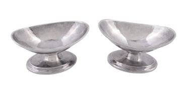 A pair of George III silver oval pedestal salt cellars by George Burrows I  A pair of George III