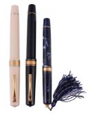 Omas, Extra, a black rollerball pen, the faceted cap and barrel with Greek...  Omas, Extra, a