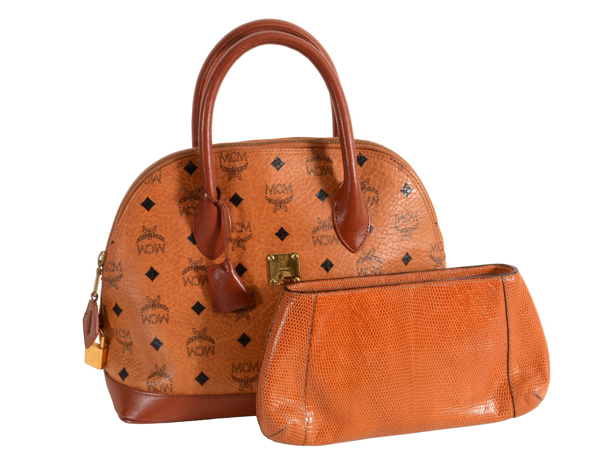 MCM, Heritage, a coated canvas bowler bag, with logo print to the outside  MCM, Heritage, a coated