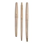 Parker, a rolled gold fountain pen, with striated decoration, a vacant reserve  Parker, a rolled