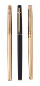 Caran D¬he, a gold colour fountain pen, engraved with vertical lines  Caran D¬he, a gold colour