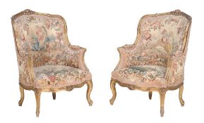 A pair of giltwood and upholstered armchairs in Louis XV style  A pair of giltwood and upholstered